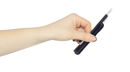 multitool for cleaning headphones in hand, outstretched hand with multitool for cleaning headphones isolated on background