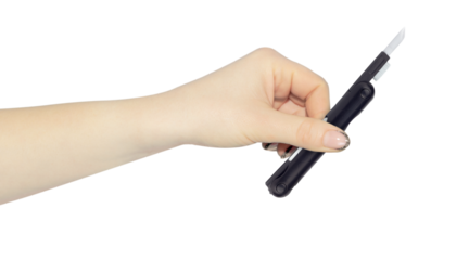 multitool for cleaning headphones in hand, outstretched hand with multitool for cleaning headphones isolated on background