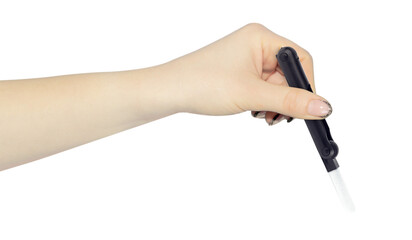 multitool for cleaning headphones in hand, outstretched hand with multitool for cleaning headphones isolated on background