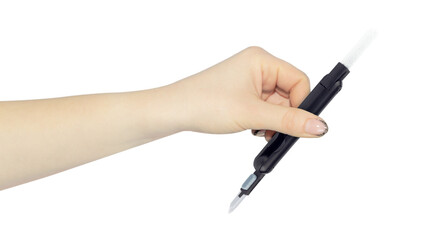 multitool for cleaning headphones in hand, outstretched hand with multitool for cleaning headphones isolated on background