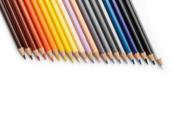 Fototapeta premium Variety of colored pencils creating spectrum on white