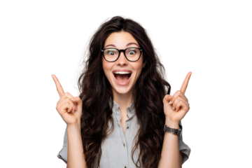 Excited young woman with glasses pointing up isolated on white background, surprised happy female portrait with long hair and open mouth expression