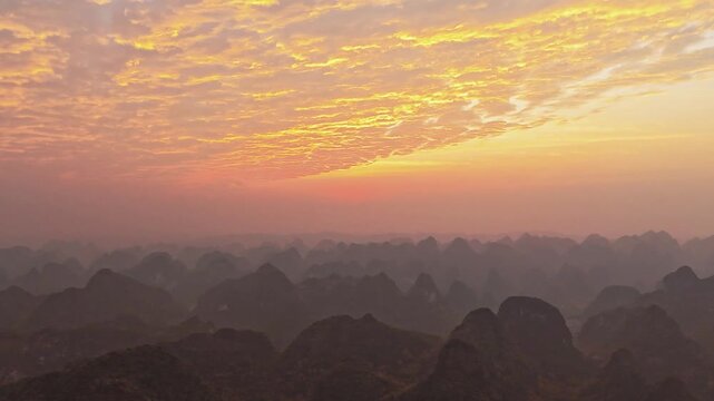 Time-Lapse of Cloud Movement at Sunset Over Karst Region