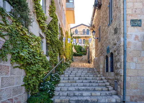 Historic street in the Mishkenot Sha'ananim(Yemin Moshe) neighborhood in Jerusalem - Powered by Adobe