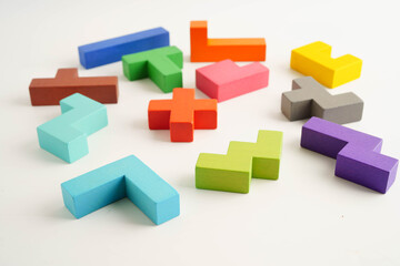 Logical thinking and problem solving problem solution creative business, wooden puzzle geometric block shape.