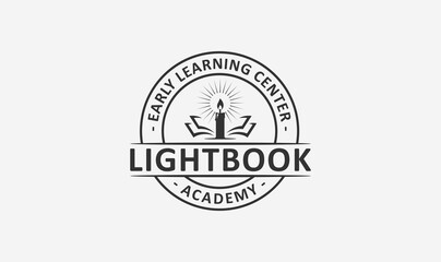education academy emblem logo design with the candle and book element.