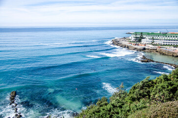 Atlantic swells at Praia Grande and oceanfront hotel, Sintra coast