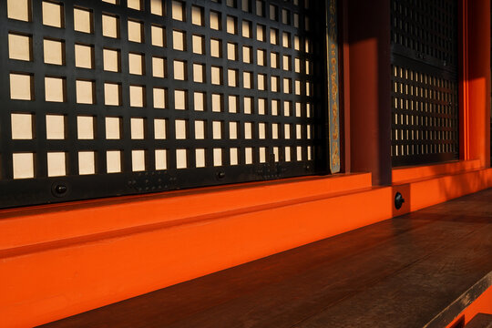 Wall of Japanese Buddhist Temple in Sunset Light. Traditional Architecture and Spiritual Heritage - Powered by Adobe