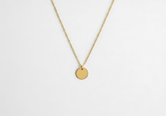 Fototapeta premium Elegant minimalist rose gold circle pendant necklace flat lay on studio shot