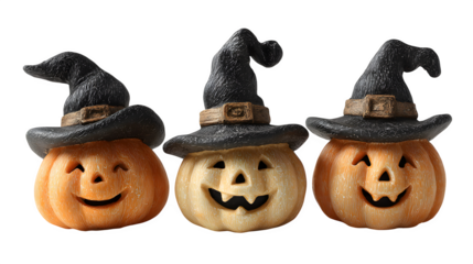 Trio of carved pumpkin lanterns with witch hats, isolated on white background