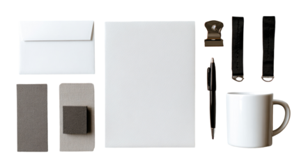 Flat lay of white stationery and office supplies.  White envelopes, paper, and a mug sit alongside gray notepads, a black binder clip, and a pen