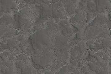 A grayscale close-up reveals a textured surface resembling weathered stone or concrete.  Irregular, pitted patterns dominate, suggesting age and erosion.