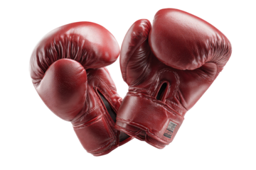 Pair of deep crimson boxing gloves.  Close-up, isolated