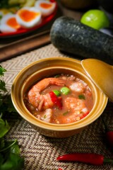 Thai  Spicy shrimp paste dip  in brown bowl