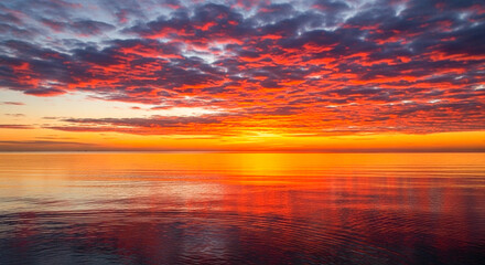 Naklejka premium sunset over the sea background image