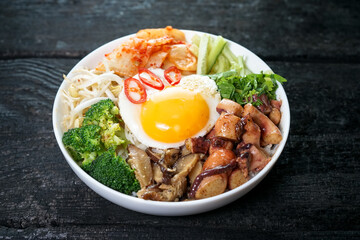 bipimbiap in a white plate on a dark background