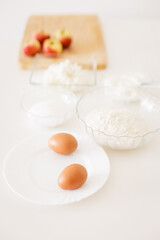 Preparing ingredients for baking apple pie on white table