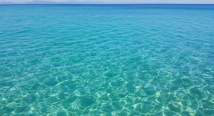 Serene Teal Waters: Sunlit Mediterranean Sea Texture