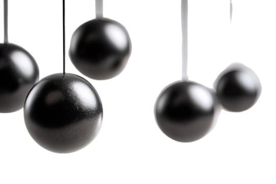 Several glossy, black spheres hang from strings against a white background.  They are a 3D render, not photorealistic, with a slightly blurred or soft focus edge