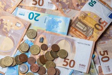 Euro currency background with banknotes and coins