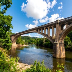 Fototapeta premium Scenic river bridge under a vibrant sky