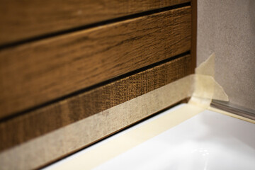 Preparatory work before sealing the grout by the tiler with silicone