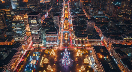 Obraz premium Aerial View of a Lit Cityscape with Christmas Decorations at Night.