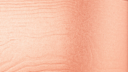 Rose gold silk fabric texture with smooth folds and shiny surface, elegant luxury background for design and decoration.