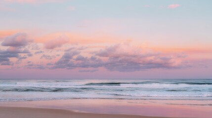 Obraz premium Soft Pastel Sunset Over a Calm Ocean Beach: Gentle Pink & Lavender Sunset Glow, Serene Beach with Calm Waves—Tranquil Coastal Scene of Pastel Hues at Dusk