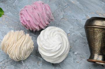 dessert marshmallows multicolored on a gray background