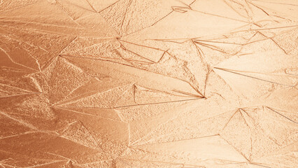 Rose gold velvet fabric texture with soft folds, shiny metallic surface, elegant abstract background for design and decoration.