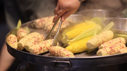 the streamed sweet corn in the food stand, are being sold in Tainan Flower Night Market or Garden night marke
