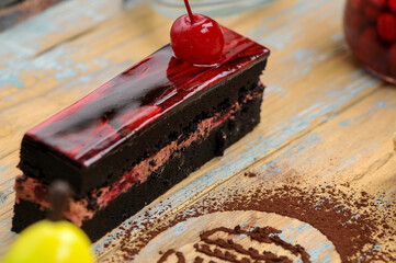 desserts chocolate cake with cherries