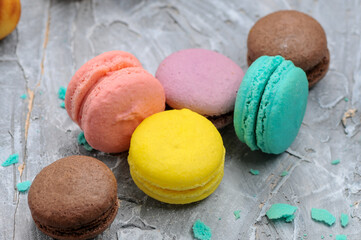 colorful macaroons on a gray background