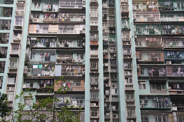 Chaotic dense urban apartment building facade crowded residential housing complex