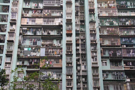 Chaotic dense urban apartment building facade crowded residential housing complex
