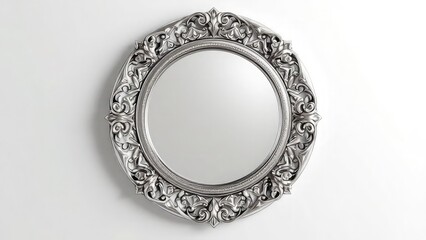Ornate silver round mirror with decorative frame hanging on a plain white wall in a well lit room