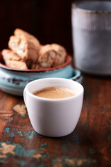 Cup of coffee on rustic wooden background. Soft focus. Copy space	