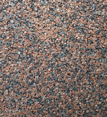Close-up of mixed brown and gray gravel texture