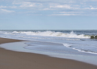 Wide Beach View with Waves - Waves Crashing on Empty Beach Under Blue Sky – Peaceful Coastal Scene