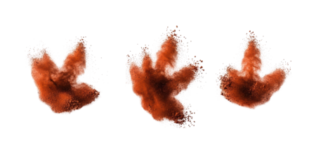 Three dynamic bursts of fine reddish-brown powder like cocoa, caught mid-air against a transparent background with copy space, high-speed macro studio shot, concept of abstract dynamic motion