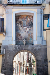 Porta San Gennaro in Via Foria, doorway to the Sanit&agrave; neighbourhood built in 928. The 1657 fresco by Mattia Preti is an ex voto offered by Neapolitans for the end of the plague, Naples, Italy. 