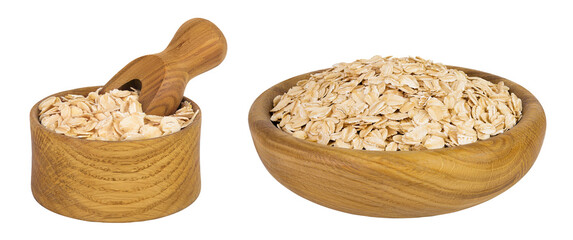Oat flakes in wooden bowl and scoop isolated on white background with full depth of field