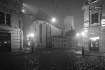 Lviv, Ukraine - November 15, 2021:  Latin cathedral in Lviv  in fog at night