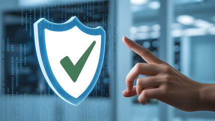 Cybersecurity Touch: An artistic capture of a hand interacting with a digital shield symbol, highlighting data protection, privacy, and secure technology.