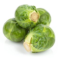 Fototapeta premium Fresh, vibrant green Brussels sprouts clustered closely together, displaying detailed leaf patterns and a light beige core, are beautifully arranged against a plain white background.