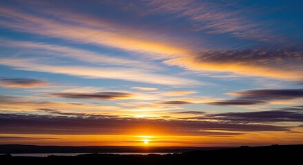 Fototapeta premium Vibrant Sunrise Sky Painting Clouds Over Tranquil Water Horizon