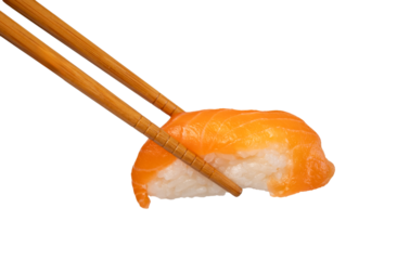 Chopsticks holding salmon nigiri on transparent background