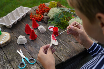 Kindergarten lessons about the environment with hands-on paper and natural material crafts.