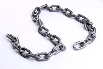 Obraz premium Iron chain isolated on white background.